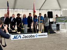Team members from JEA, Jacobs, and Haskell hold shovels as part of the groundbreaking ceremony
